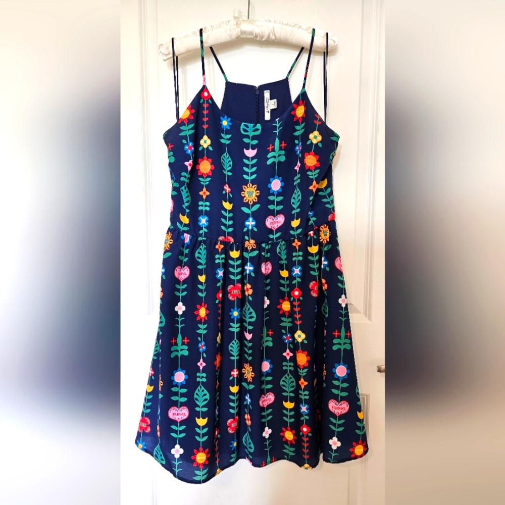 First release Disney Dress Shop Mary Blair "It's a Small World" navy dress.